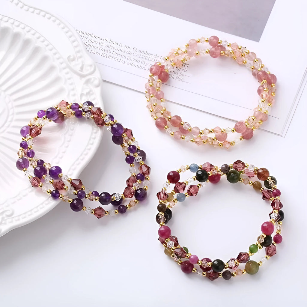 Handmade three-ring bracelet with colourful tourmaline, strawberry quartz, and amethyst beads on an adjustable cord.