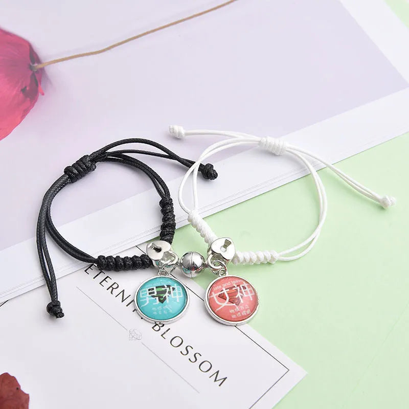 Alloy magnetic suction bracelet pair for couples with symbolic design options