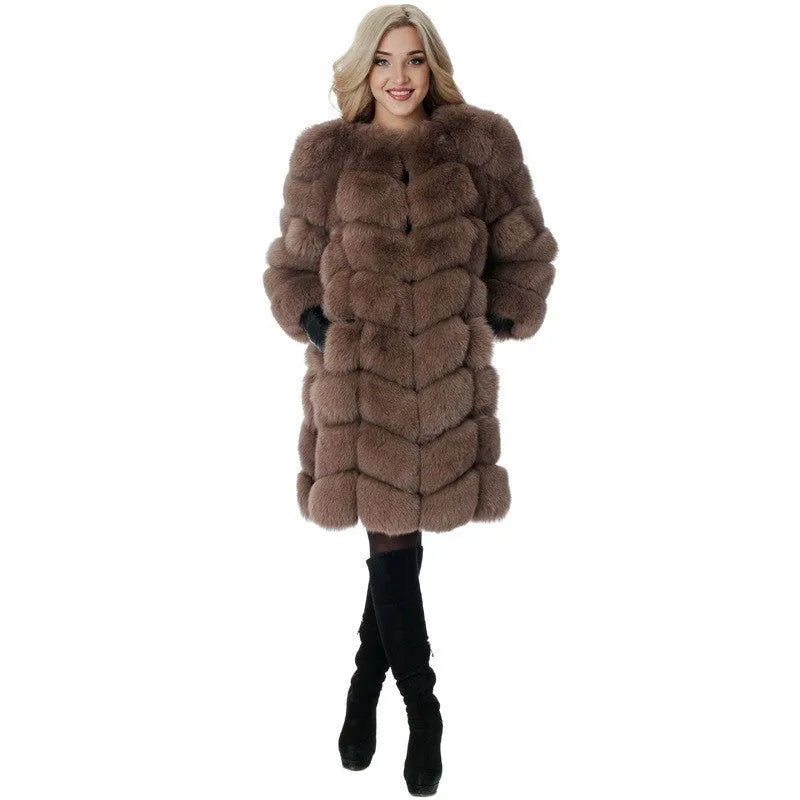 Women's long artificial fur coat in a wine red colour, showing regular sleeves and a mid-length fit.