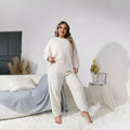 Women's milky white polyester two-piece lounge set with crew neck top and trousers