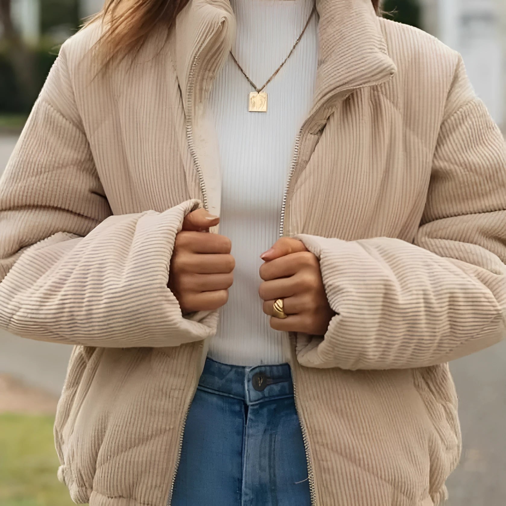 Apricot-coloured women's corduroy jacket with a stand collar and front zipper.