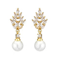 Geometric floral design earrings with micro inlaid zircon detail in gold, platinum, or rose gold plating.