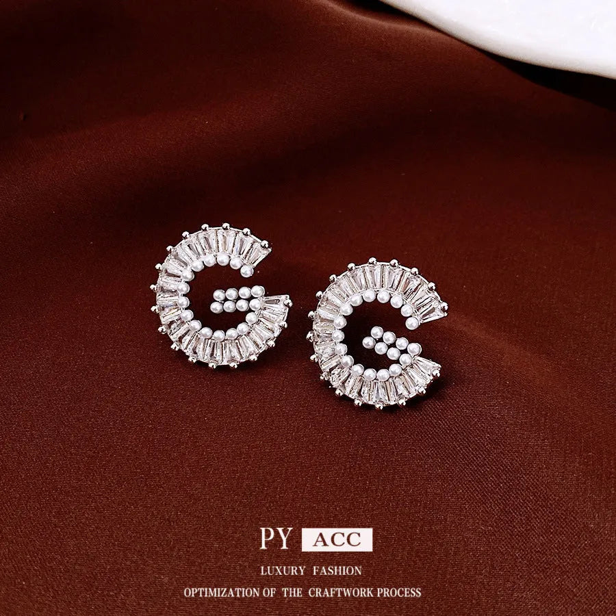 Silver alphabet letter earrings with imitation pearl and inlaid zircon for women light luxury fashion