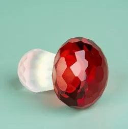 Colourful acrylic mushroom crystal decoration in geometric style, measuring 40mm by 53mm.