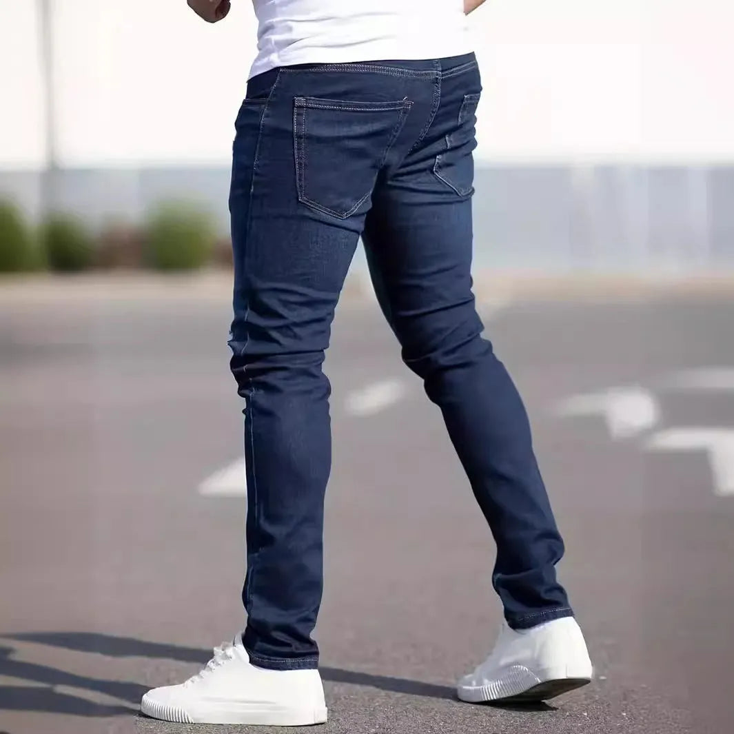Men's dark blue slim street fashion jeans with mid waist and zipper fly