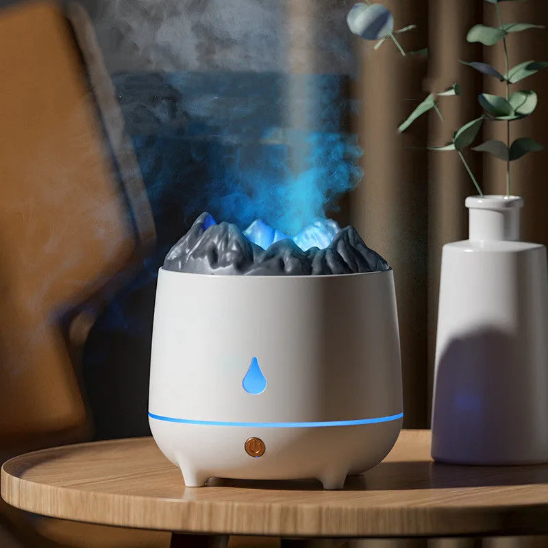 White or black volcano-shaped ultrasonic humidifier with USB cable for rooms up to 20 square metres.