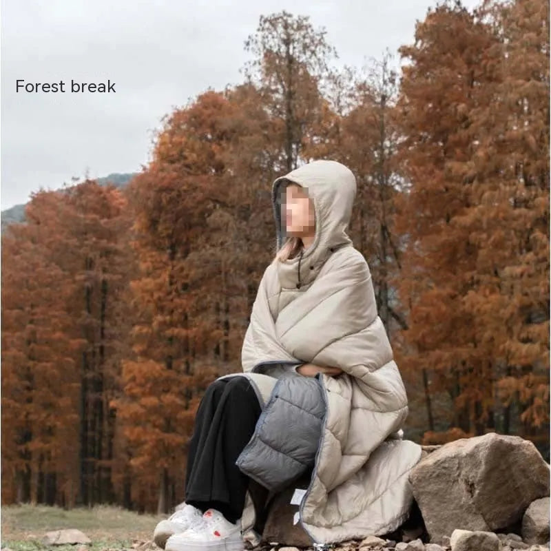 Outdoor cloak sleeping bag shown as wearable cape and as traditional sleeping bag