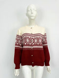 Women's alpaca wool cardigan with contrast colour diamond pattern showing long sleeves and street fashion styling