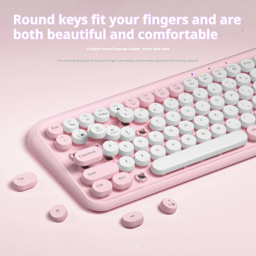 Pink portable Bluetooth wireless keyboard with 84 keys and compact design