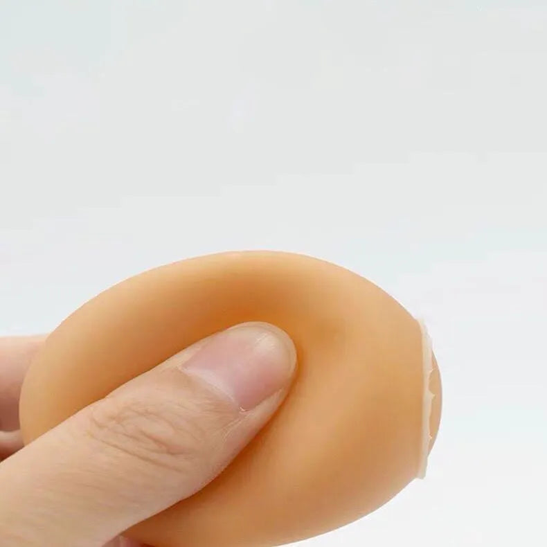 Egg-shaped plush dog chew toy with squeaker for small to medium breed puppies