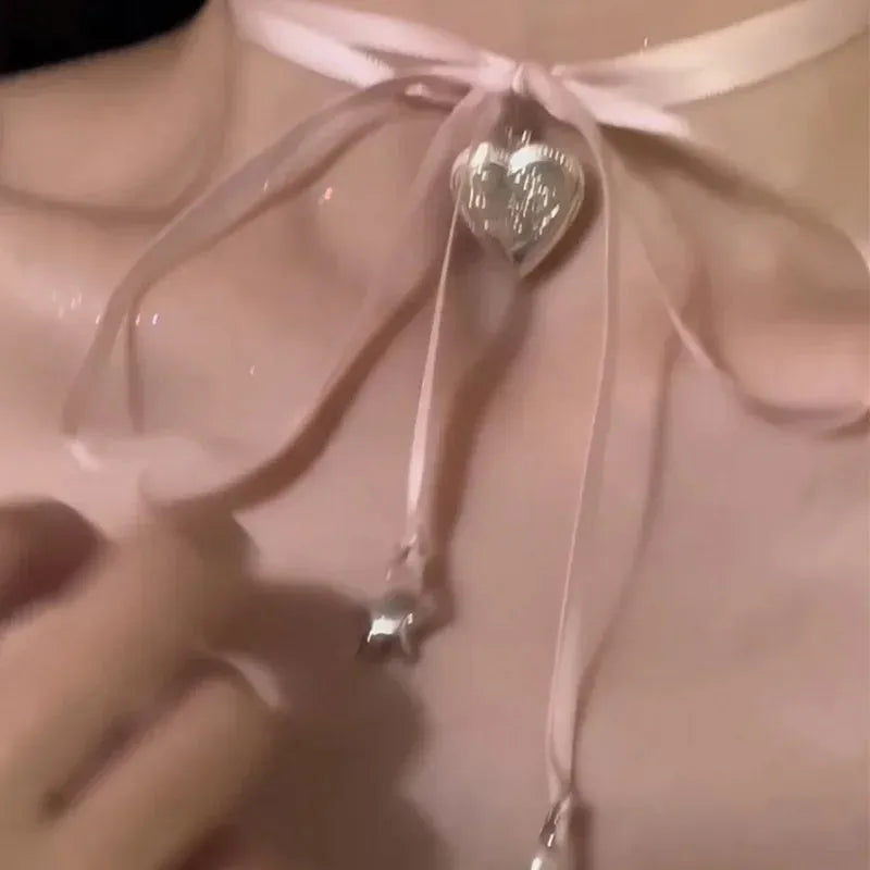 Women's alloy fashion necklace with love pendant and ribbon design in electroplated finish