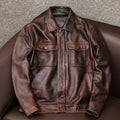 Men's black plus size PU leather jacket with side pockets on a mannequin, showing loose fit.