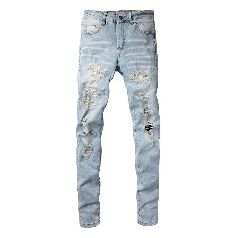 Light blue men's elastic slim fit jeans with hot diamond patch and whisker scrape detailing
