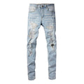 Light blue men's elastic slim fit jeans with hot diamond patch and whisker scrape detailing