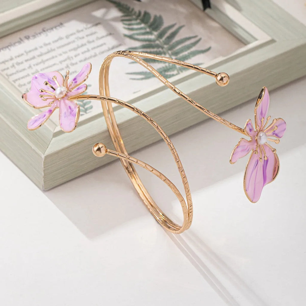 Alloy armband with hollow line pattern in pink or purple metallic finish
