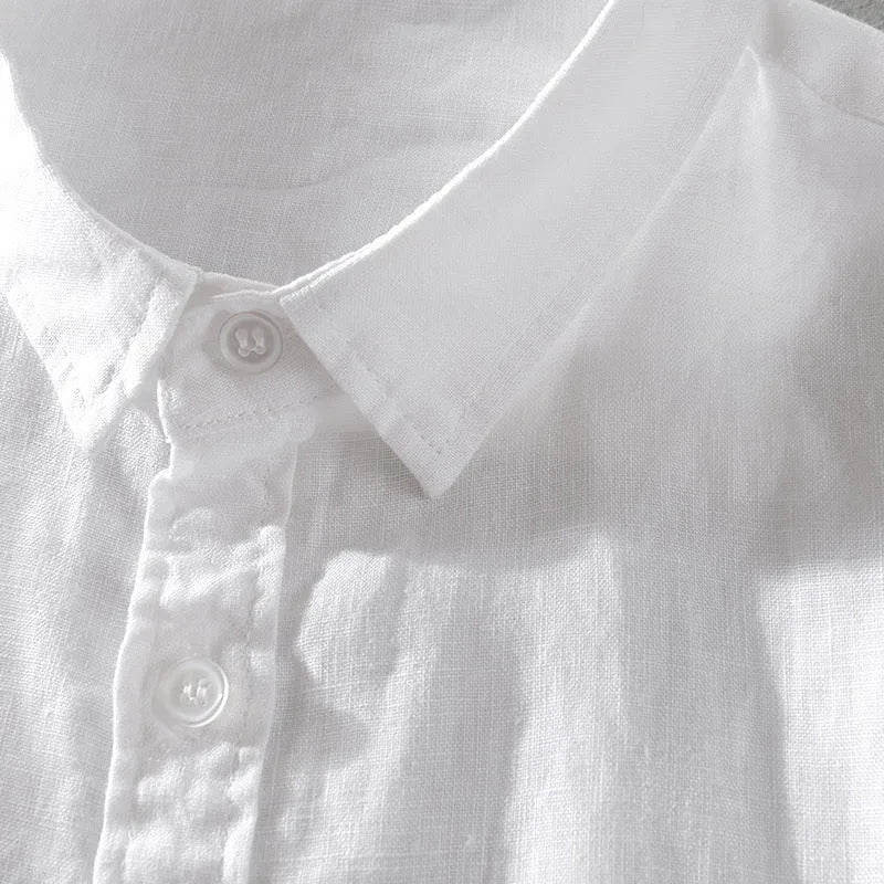 Man wearing a loose fit apricot coloured short sleeve linen cotton blend casual shirt