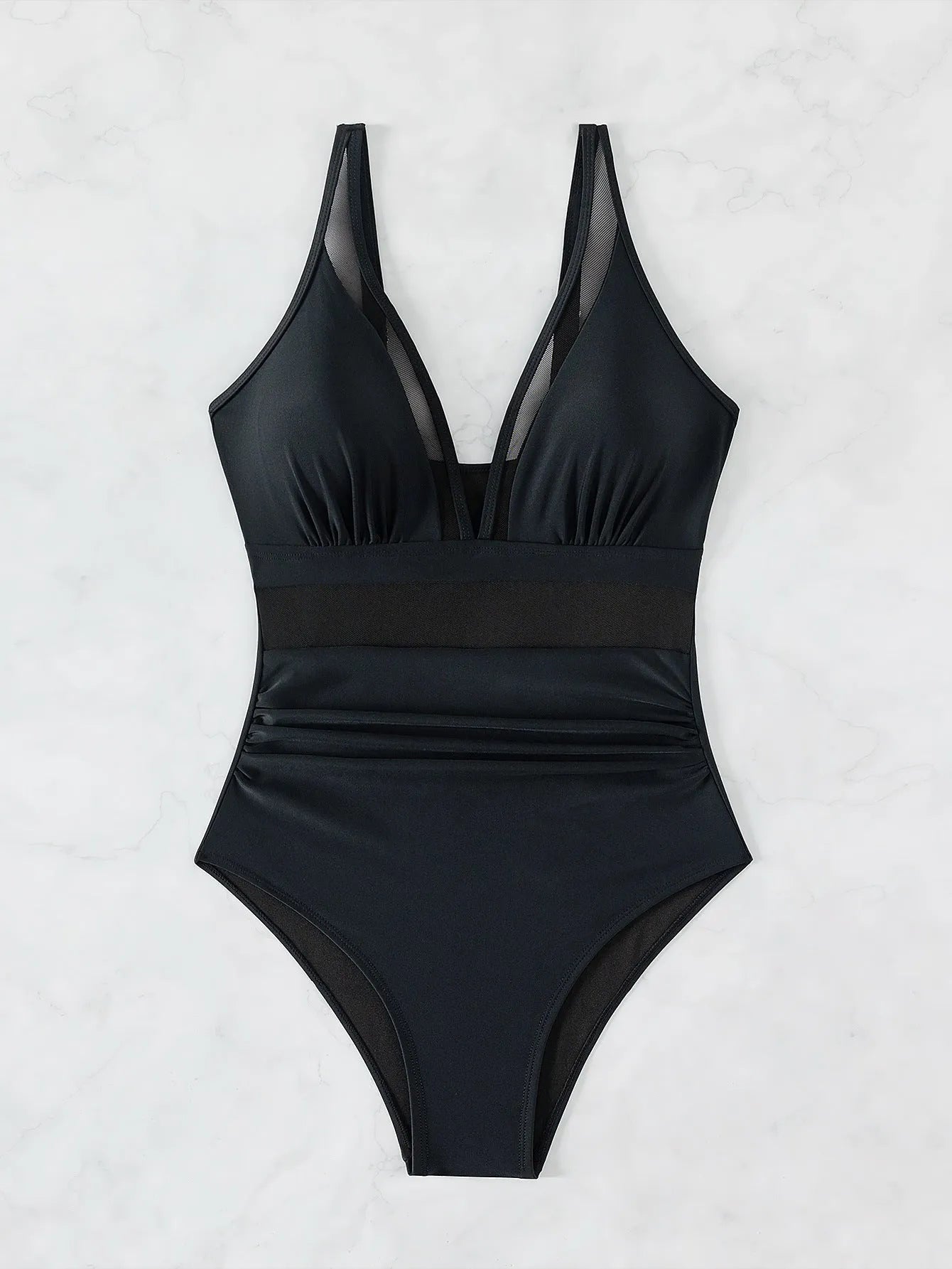 Black women's one-piece swimsuit with mesh halter detailing and sleeveless briefs style