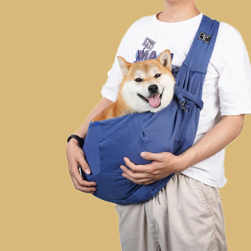 Grey foldable cat carrier bag with mesh windows and adjustable shoulder strap