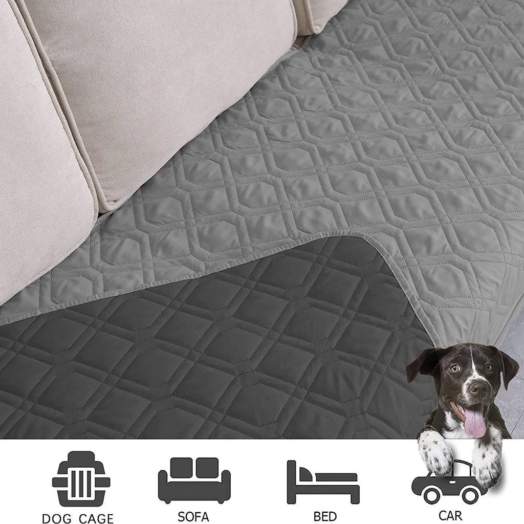 Waterproof reversible dog blanket on a sofa, showing two colour sides, with size chart for nine options.