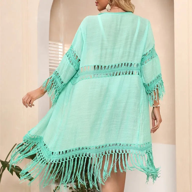 Hand crocheted women's beach cover-up cardigan with tassel stitching in solid colour