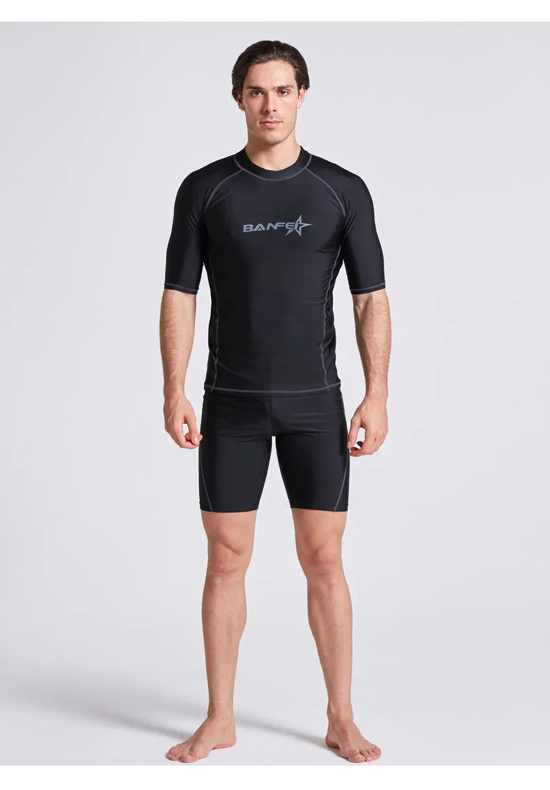 Men's quick-drying half sleeve swim top and pant set in nylon fabric on a white background.