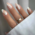 Golden lines plaid pattern on medium drop-shaped wearable nail stickers with jelly glue adhesive.