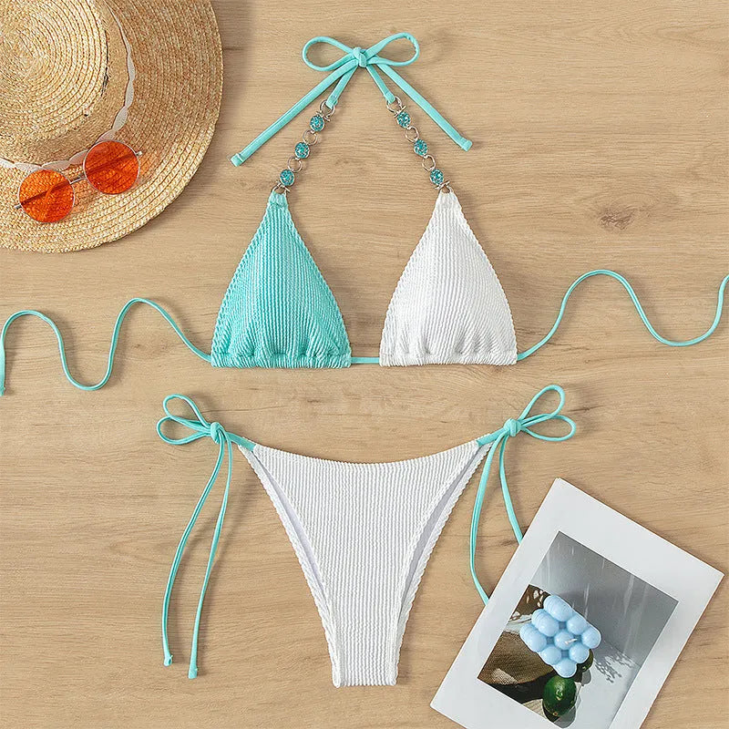 Women's two-piece swimsuit with lace-up back closure and pearl chain decoration in colour matching pattern