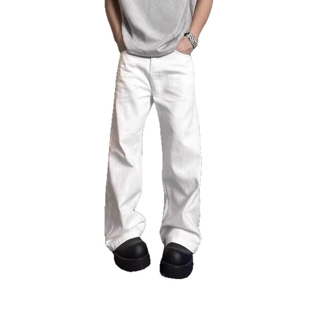 Men's white loose fit wide-leg straight denim jeans on a mid-waist model.