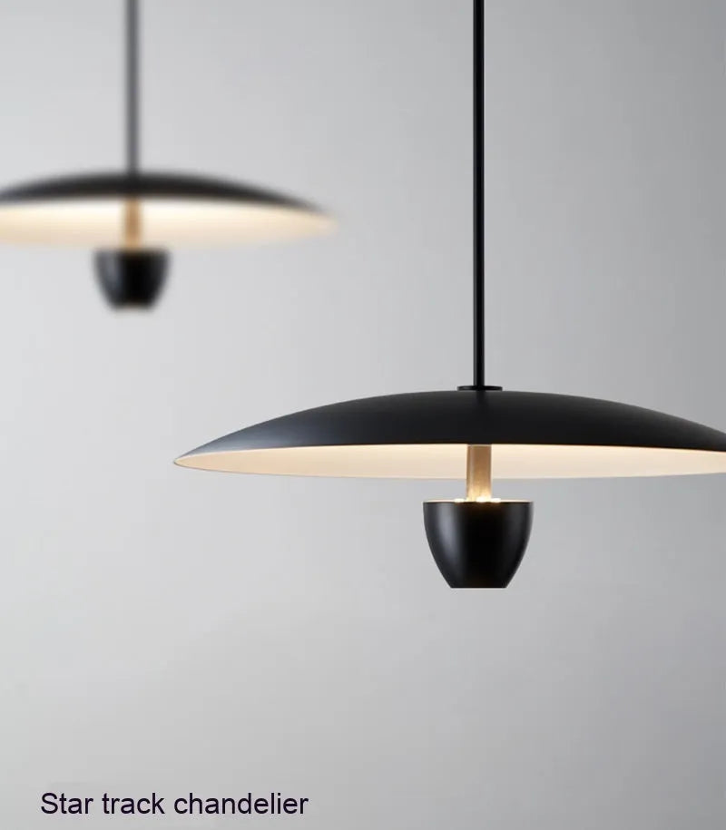 Black Nordic minimalist ceiling chandelier with warm white lighting