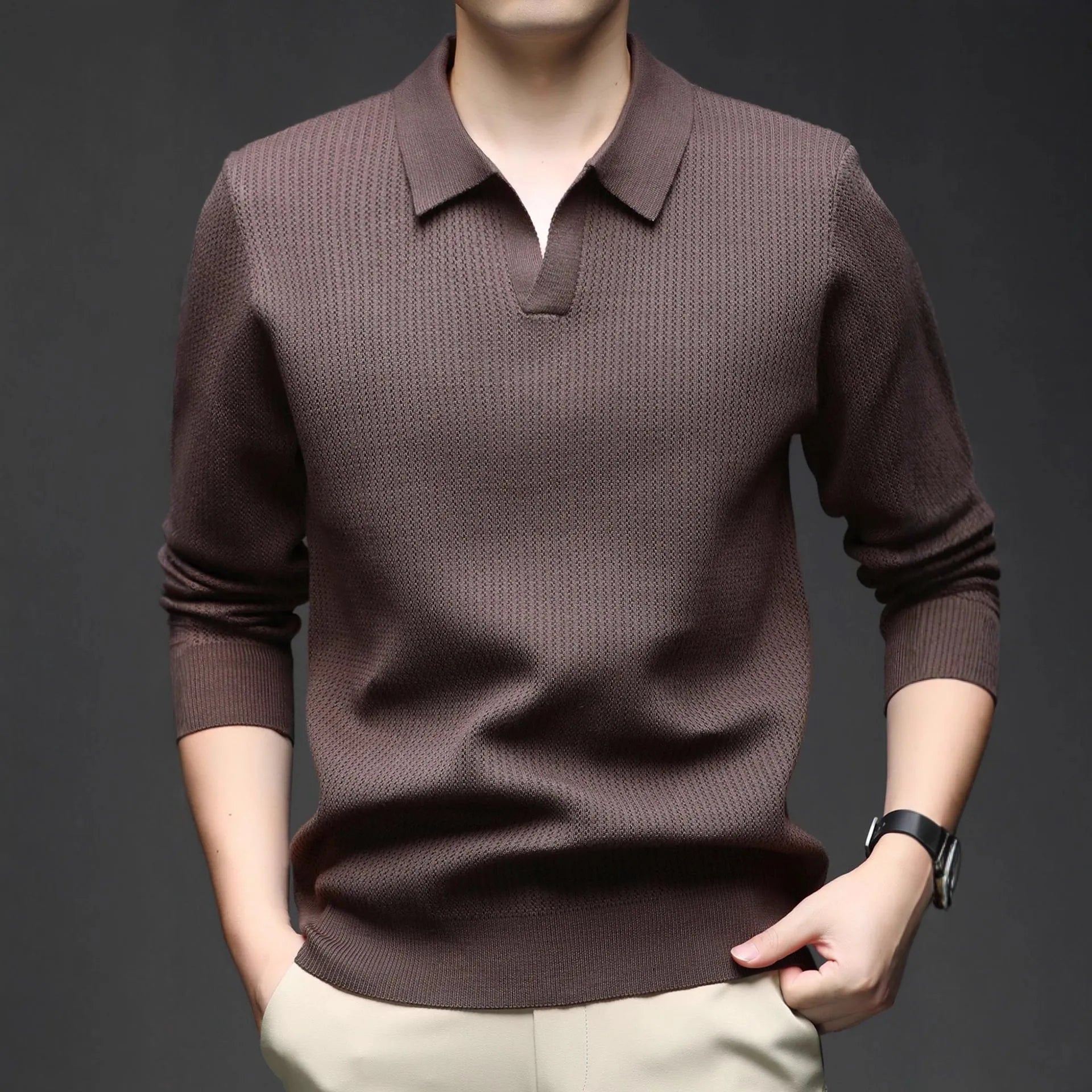 Men's loose fit long sleeve pullover sweater in green, shown flat.