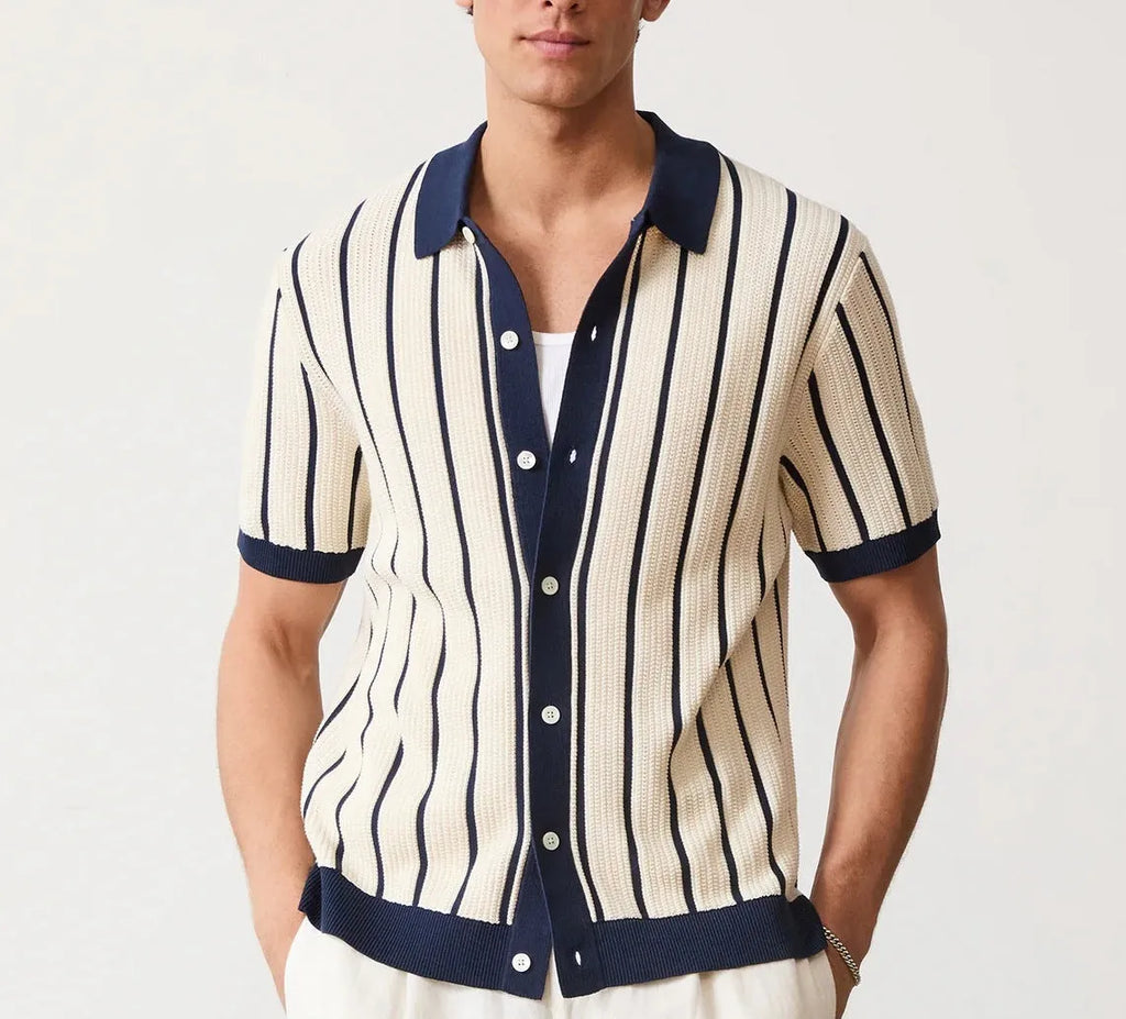 Men's white asymmetric lapel knitted short sleeve top laid flat.
