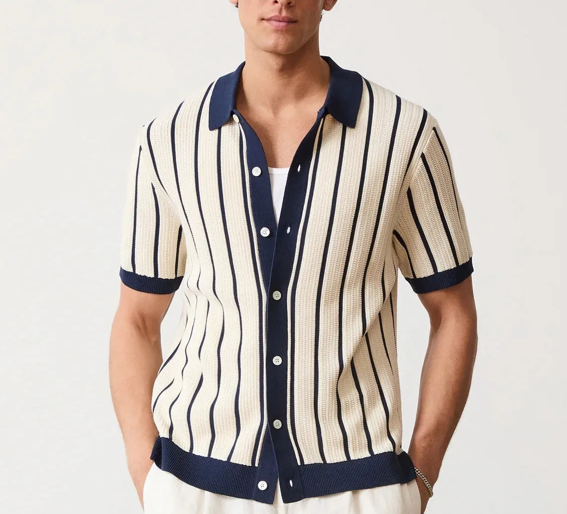 Men's white asymmetric lapel knitted short sleeve top laid flat.