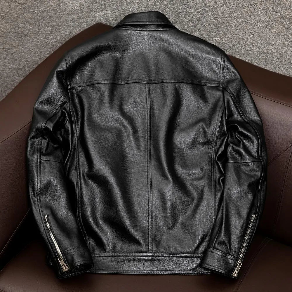 Men's black plus size PU leather jacket with side pockets on a mannequin, showing loose fit.