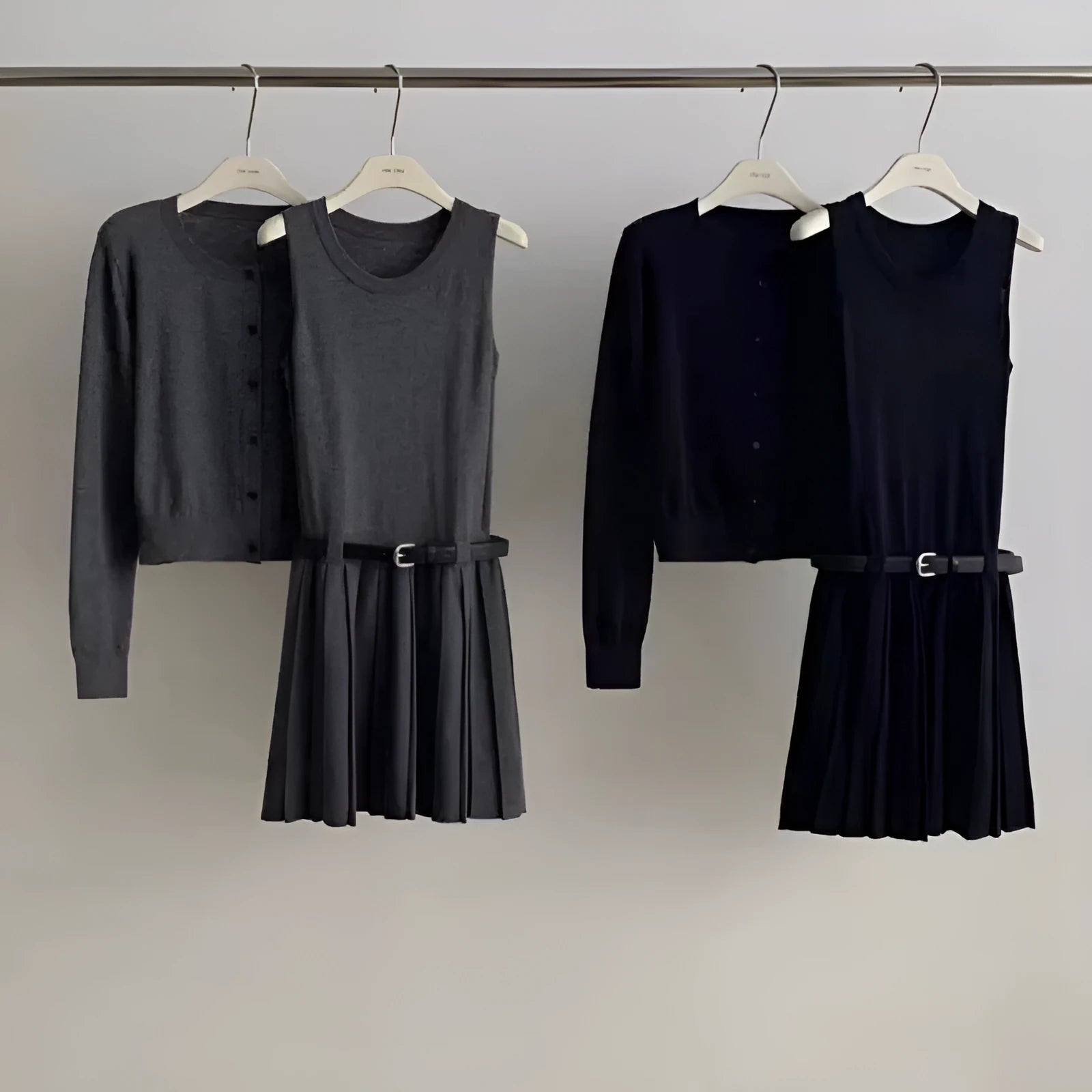 Women's black knitted vest skirt and cardigan two-piece set with 3D pattern and adjustable belt