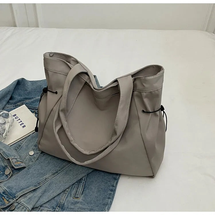 Soft Oxford cloth commuter shoulder tote bag in multiple colours with folding street trend design