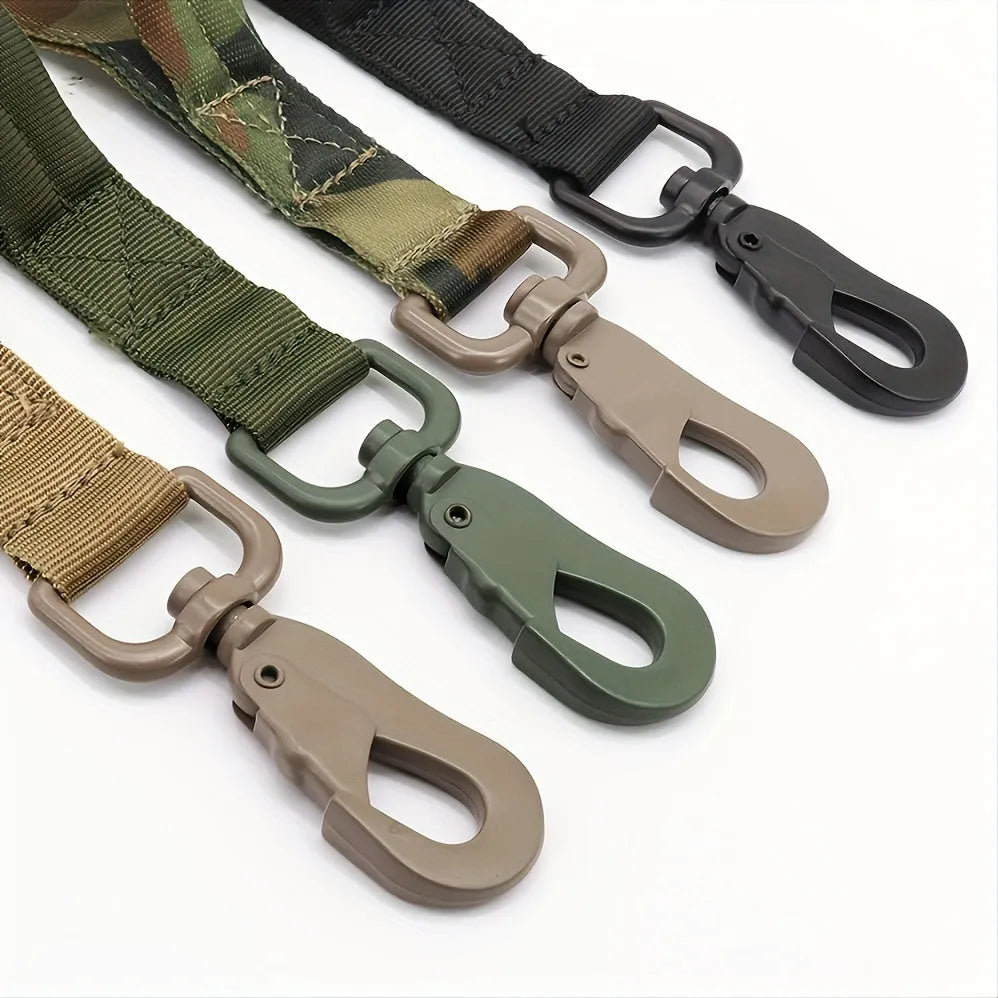 Retractable leash for large dogs in black with anti-burst technology on a grassy park background