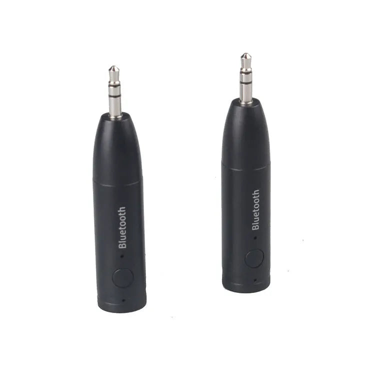 Black AUX Bluetooth 5.0 audio receiver for car stereo with USB cable.