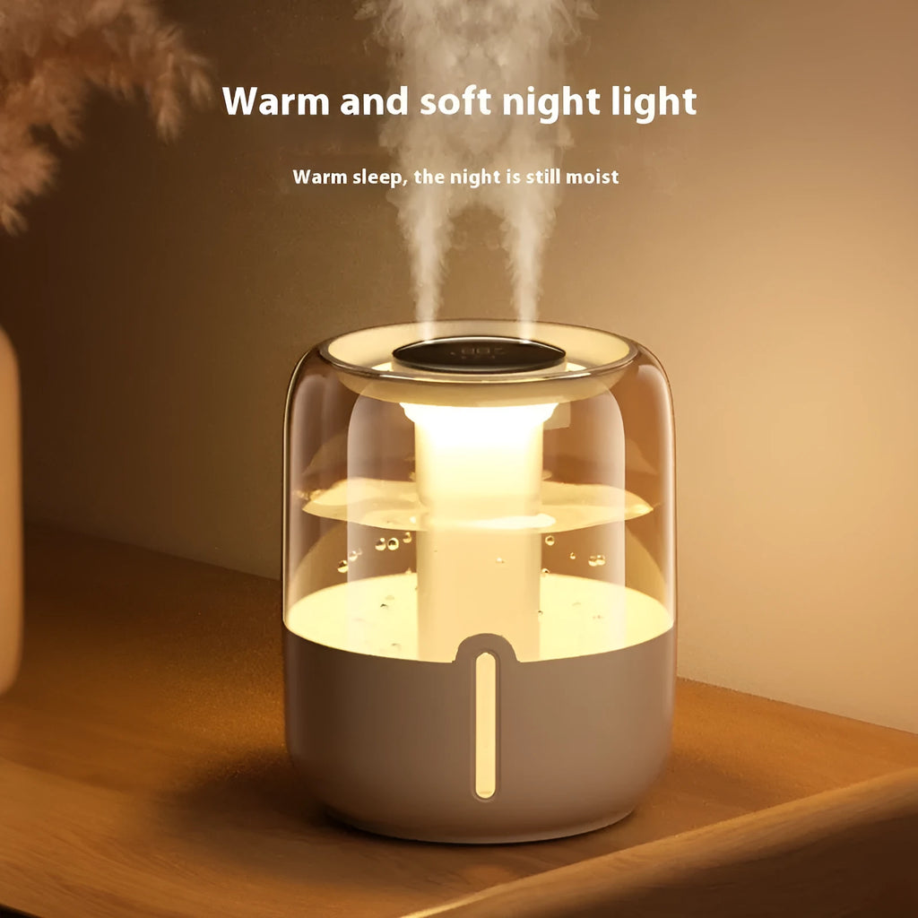 Beige round USB humidifier with dual spray nozzles and digital humidity display on a desk