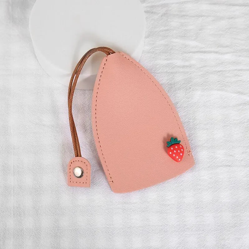 Cartoon design pull-out key case for car keys in PU leather.
