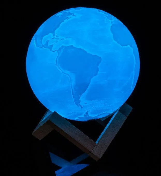 3D printed moon lamp with touch metal ring control on wooden stand, showing white and yellow light settings