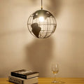 Nordic iron pendant light with 300mm shade, button switch, black finish, adjustable cord, over a wooden dining table