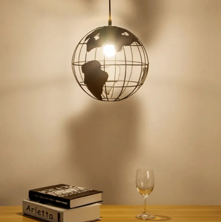 Nordic iron pendant light with 300mm shade, button switch, black finish, adjustable cord, over a wooden dining table