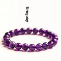 Natural amethyst Uruguay bracelet with scattered polished beads on a single ring.