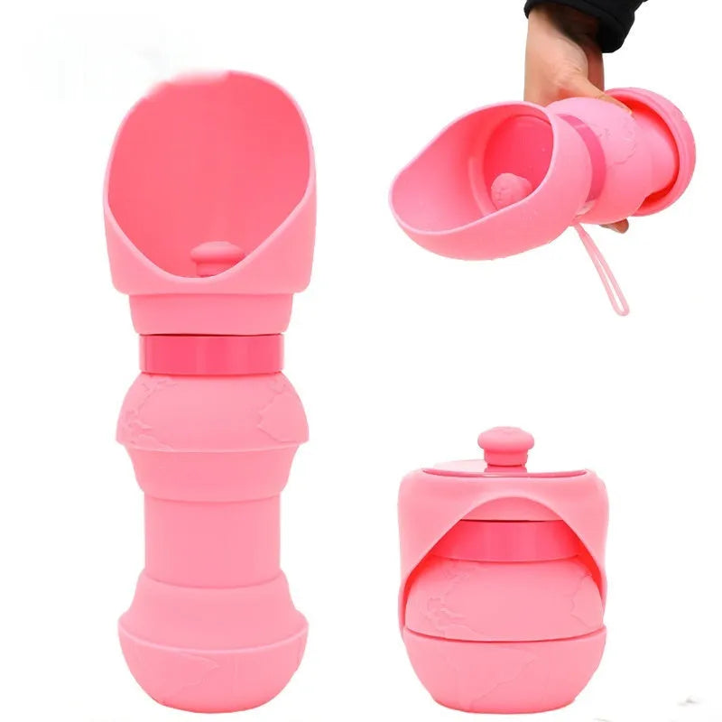 Silicone pet folding water cup shown in pink colour, unfolded ready to use.