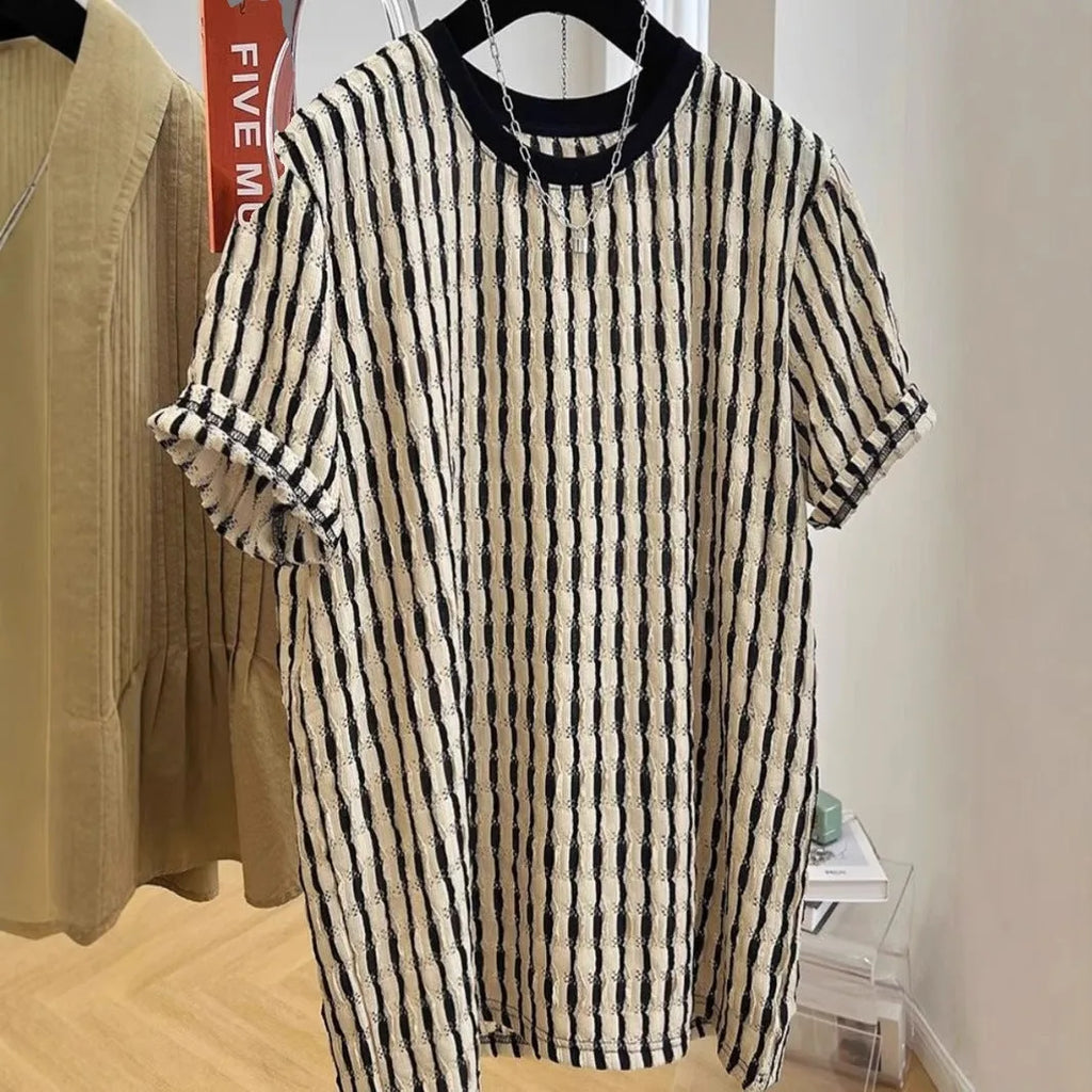Black striped men's loose casual short sleeve pullover shirt made from linen and silk blend.