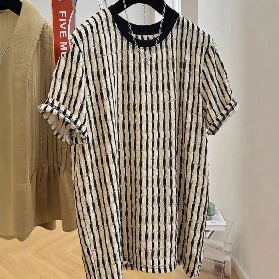 Black striped men's loose casual short sleeve pullover shirt made from linen and silk blend.