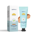 Bottle of curdling sunscreen moisturising liquid foundation in a natural colour shade.