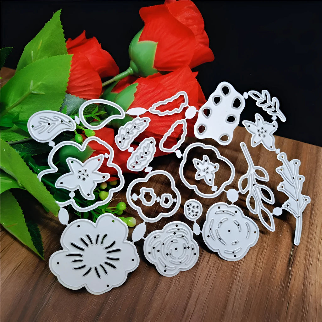 Silver carbon steel flower cutting die for papercraft measuring 14.3 by 9.9 centimetres