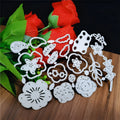 Silver carbon steel flower cutting die for papercraft measuring 14.3 by 9.9 centimetres