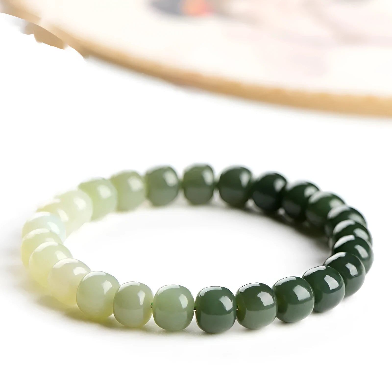 Natural Hetian jade water gradient bracelet with polished beads in clear tones